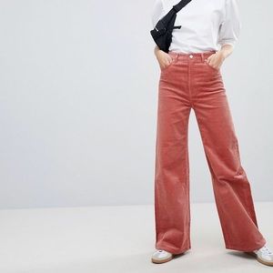 Pink corduroy flare trousers
